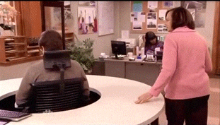 gif of a woman trying to get a man's attention