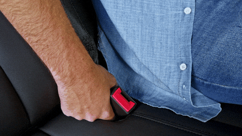 gif of man buckling seatbelt