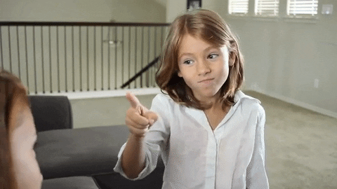 gif of little girl hugging herself