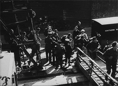 gif of men boarding a boat