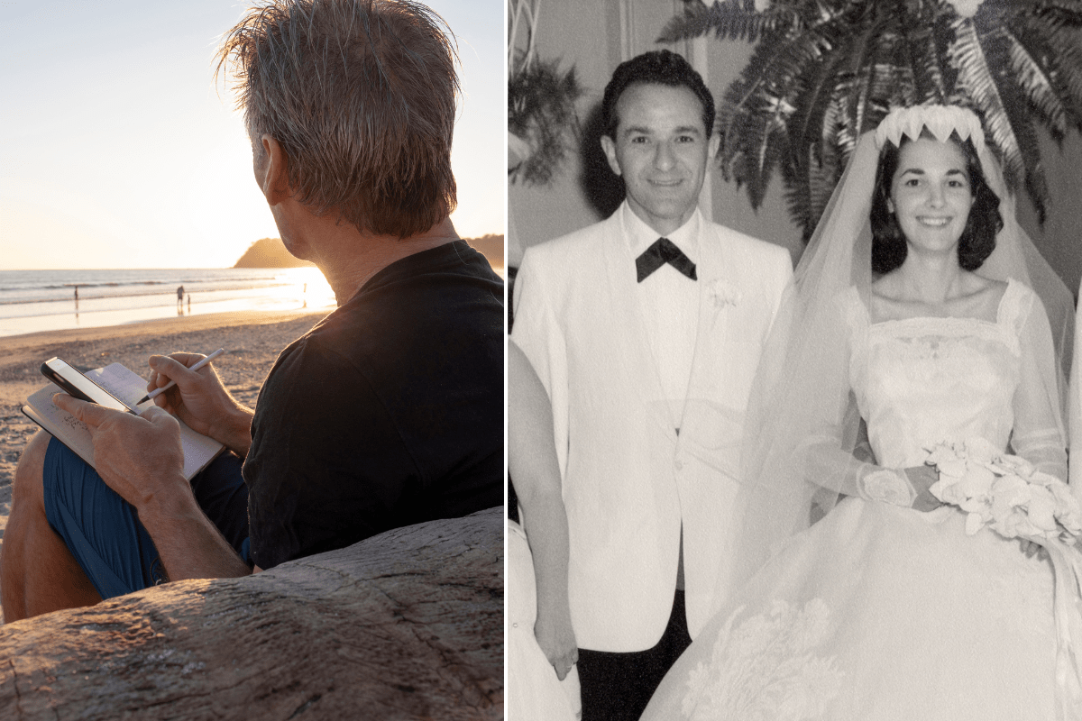 older man writing in notebook at the beach; black and white wedding photo
