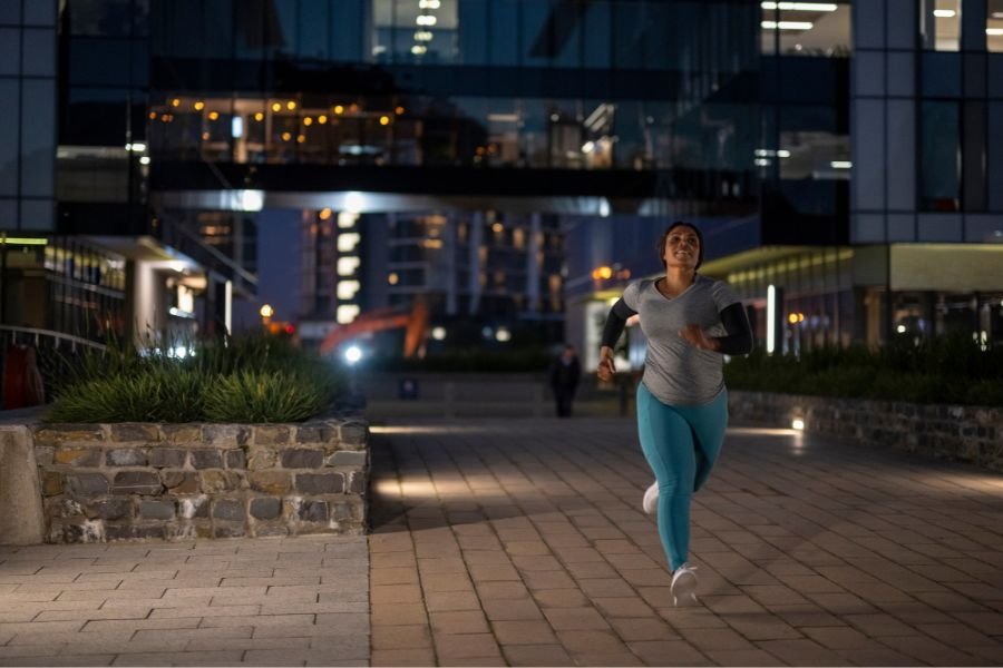 woman running in the dark