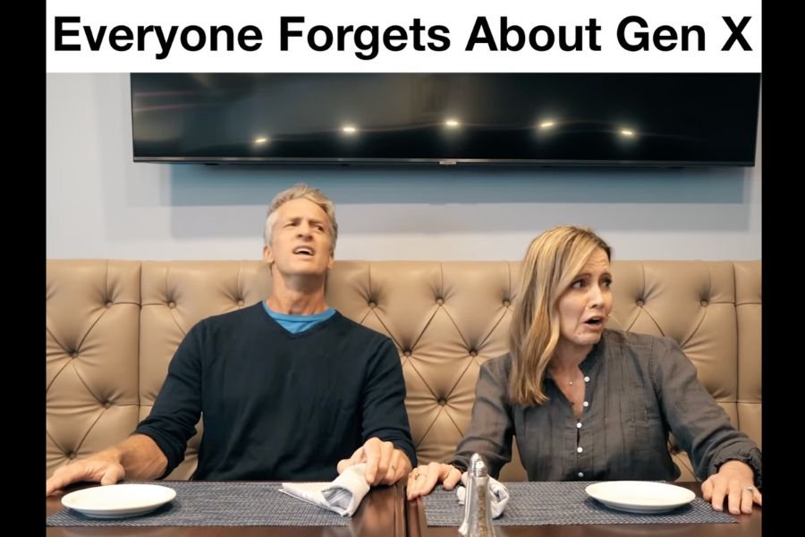 Penn and Kim Holderness sitting in a restaurant