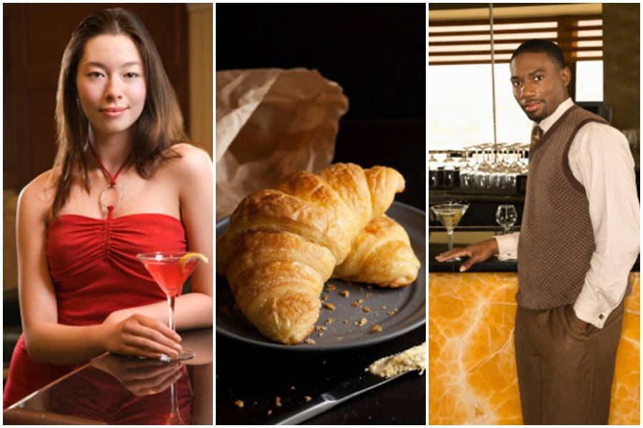 a woman in a red dress with a drink; a plate of croissants; a man standing across the bar