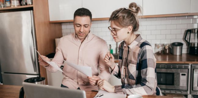savings, retirement, couple doing bills, responsibility, wisdom, advice