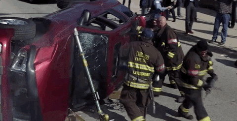 gif of firemen saving someone from a crashed car