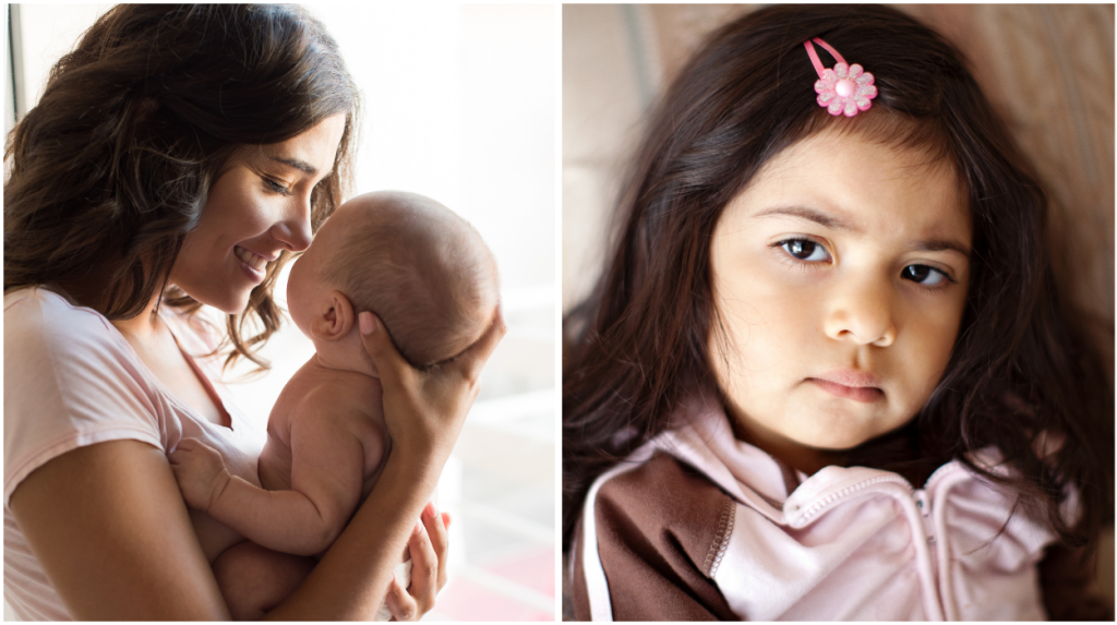 Adult woman cradling baby, sullen toddler