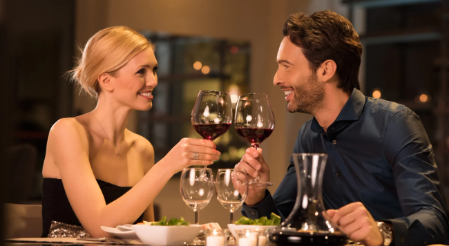couple eating dinner, wine, romantic dinner, cheers, couple drinking wine, wine glasses