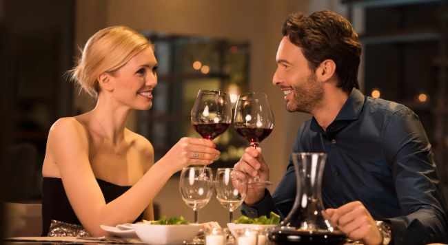 couple eating dinner, wine, romantic dinner, cheers, couple drinking wine, wine glasses