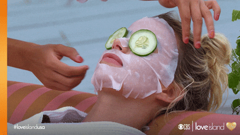 gif of a woman getting a facial