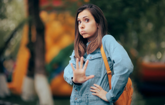 woman, no, woman says no, no kids, childfree, millennial, young woman, talk to hand