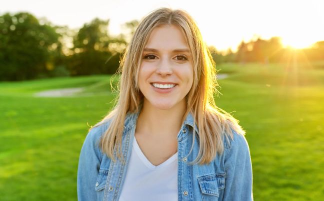 woman 30s, blonde woman, happy woman, woman listening, free woman, brown-eyed woman