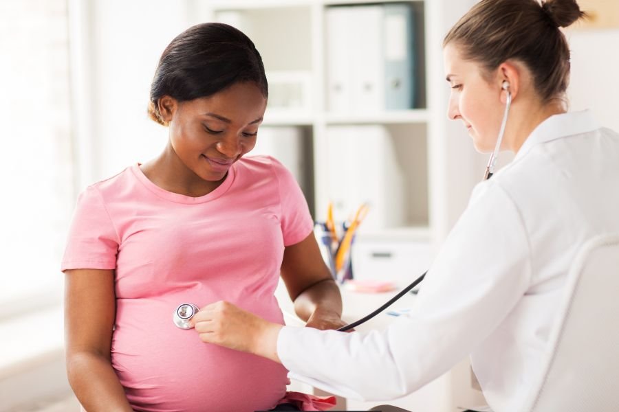 pregnant woman, black woman, black maternal health week, motherhood, doctor,