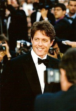 Hugh Grant reveals the 'manly' reason his favorite film could be an issue for his wife