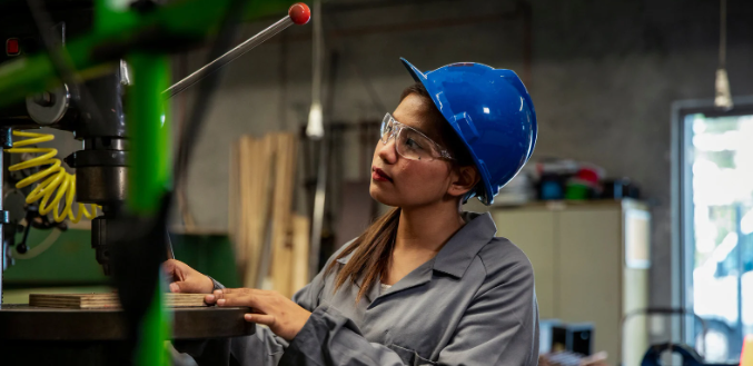 new skill, labor, woman in hard hat, drill press, factory