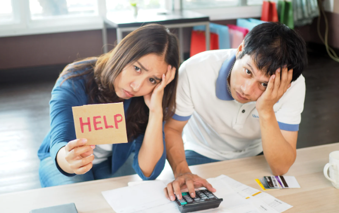 broke, bills, paycheck to paycheck, scared woman, finances, american life