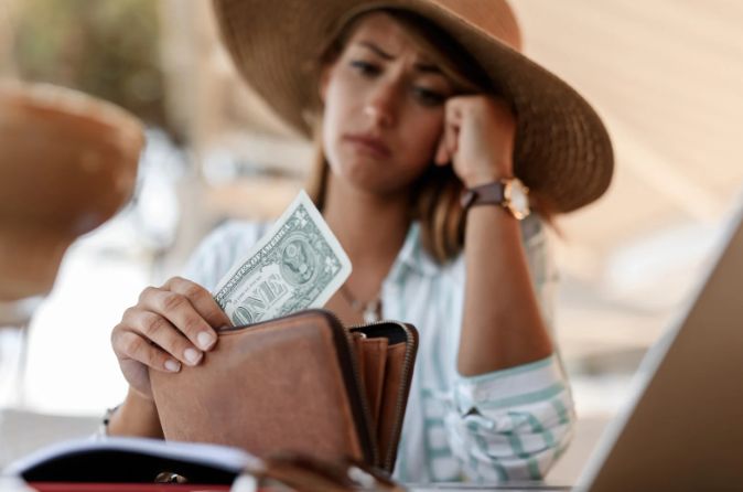 broke, bills, paycheck to paycheck, scared woman, finances, american life