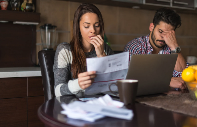 broke, bills, paycheck to paycheck, scared woman, finances, american life