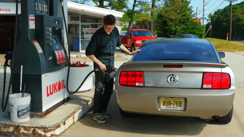getting gas, gas pump, gas station, car, luxury