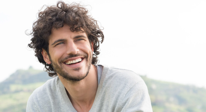 handomse man, male model, curly hair, good-looking man, man smiling