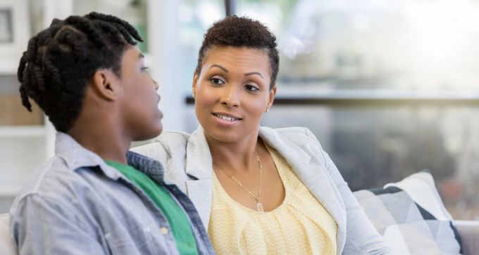 teens, mom and teen son, parenting, modern families, son and mom on couch, talking to teens