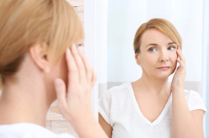 aging, aging woman, wrinkles, aging science, woman in tank top