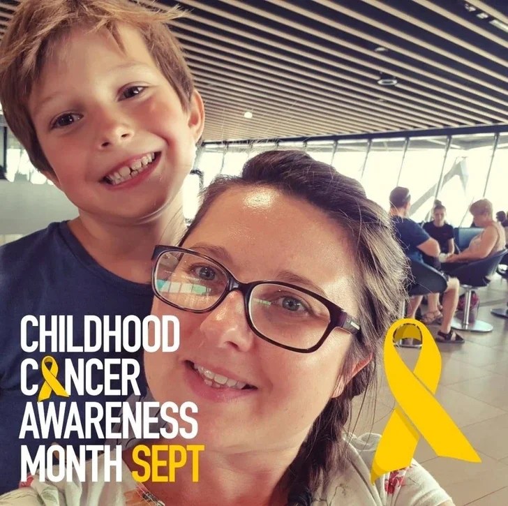 Lucas Jemeljanova poses with his mother to mark cancer awareness month