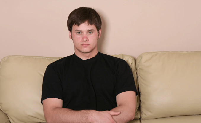 no personality, blank stare, no self, personality, beige couch,