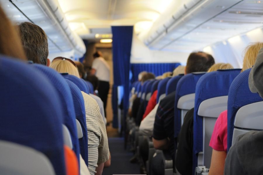 airplane seat; plane seat; entitled parents; man takes seat back; airlines; flight attendant