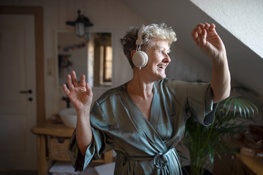 woman dancing alone, enjoying alone time