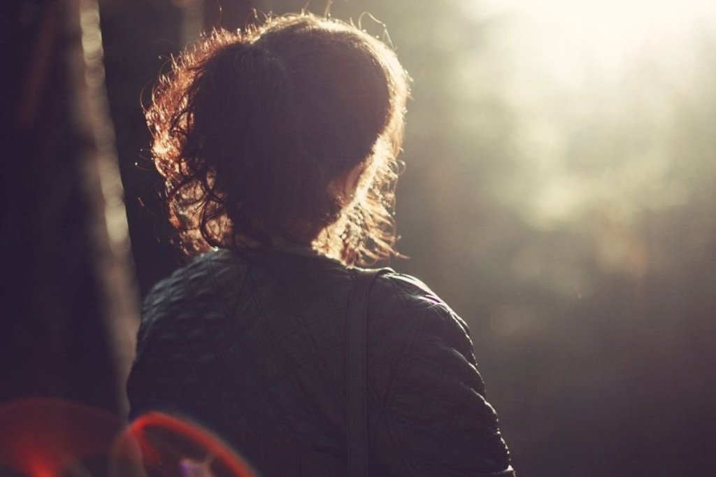 woman sitting alone, solitude, being by yourself, enjoying alone time