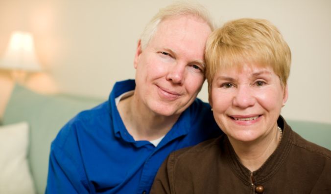 baby boomers, grandparents, 60s couple, older couple, smiling boomers