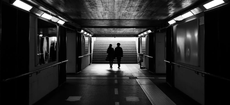hallway, exit, people leavinh, shadows, black and white, hallway
