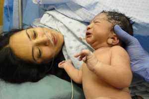 c-section; self-inflicted c-section; woman does own c-section; childbirth; delivering baby; emergency c-section