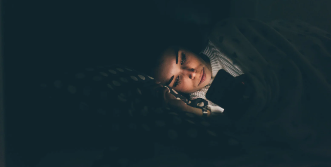sleep, night, phone in bed, doomscroll, woman in bed, smartphone