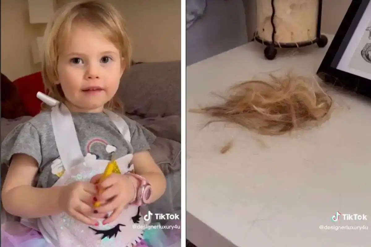 Screenshot of toddler beside pile of cut hair