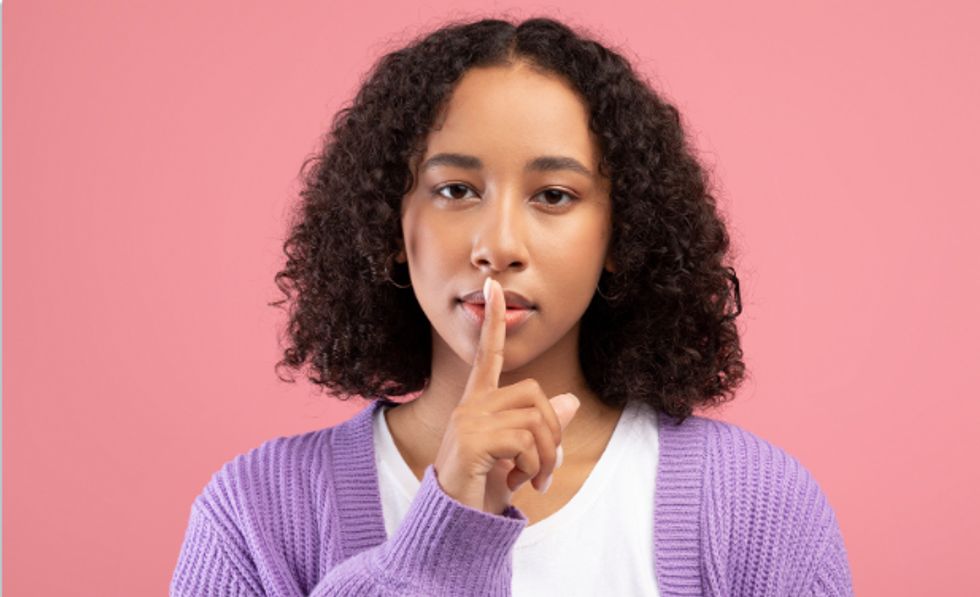 shhh, shush, finger over mouth, girl saying quiet, end of conversation, finger over mouth