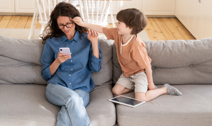 frustrated mom, child behavior, problem child, mom and phone, pulling hair