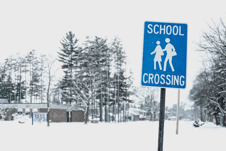 Detroit man; lost girl; Detroit; snow; school; walks child to school; CPS