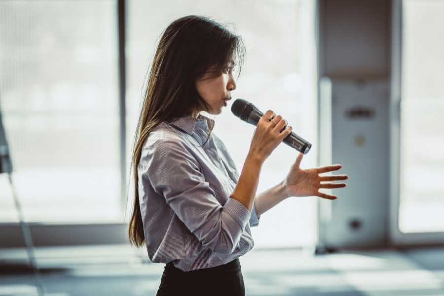 Public speaking expert shares a counterintuitive hack to keep your voice from shaking when you speak