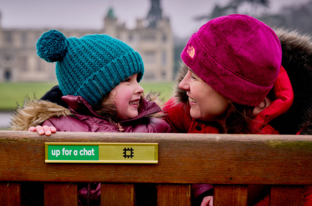 62 percent of new parents say they’re lonely. England put four words on a park bench, and it’s working.