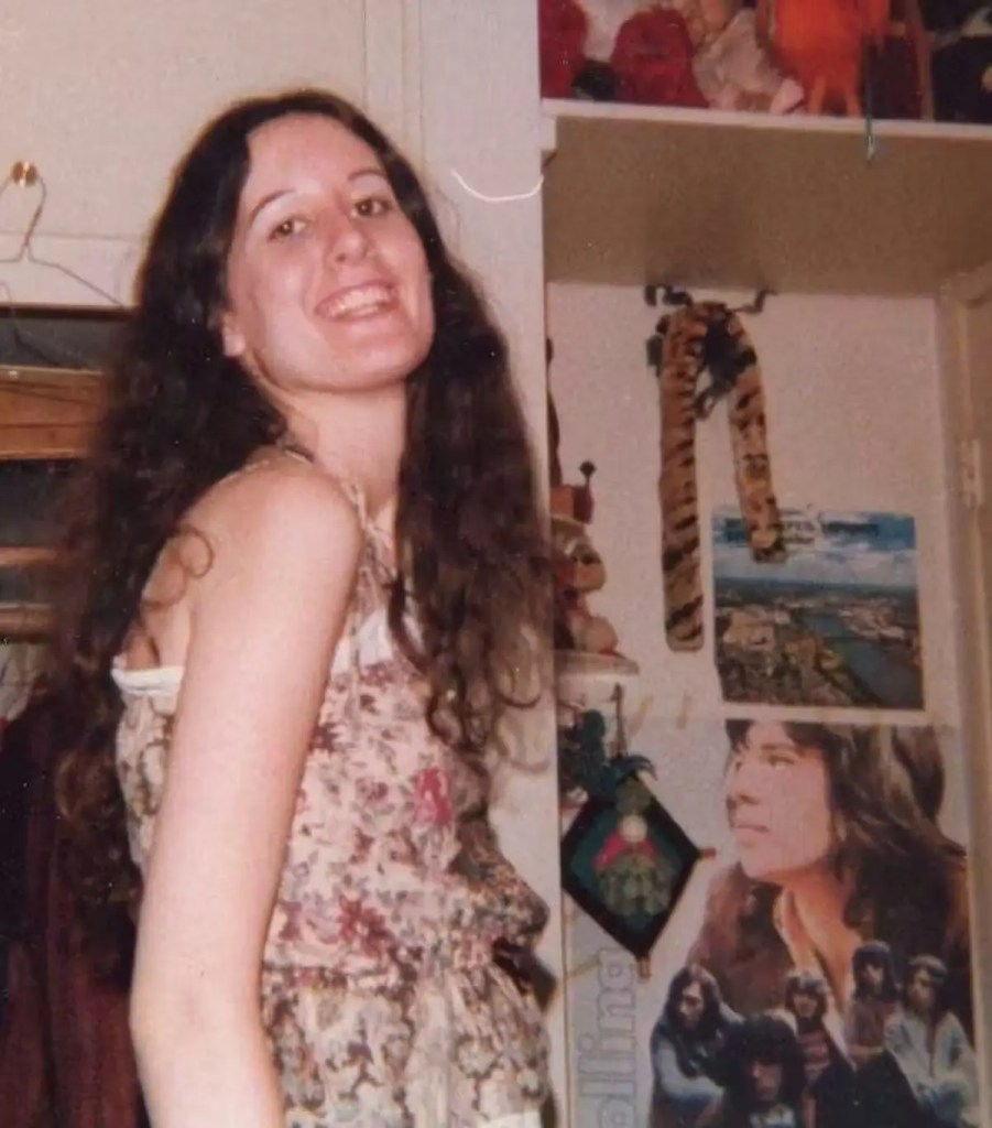 A Generation Jones teenager poses in her room.