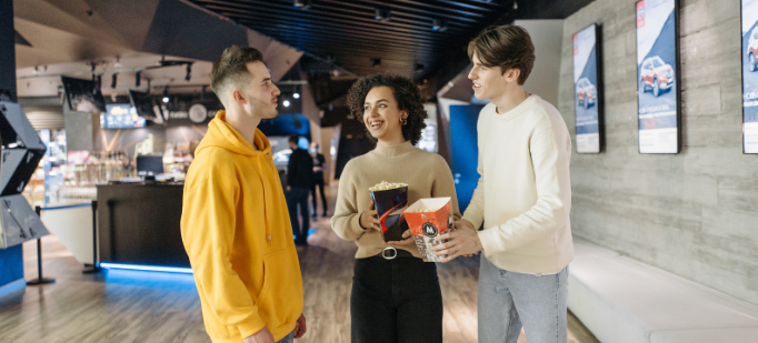 chatting before movie, popcorn, movie theater, snacks, small talk