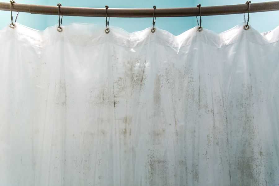 shower curtain; shower liner; get orange out; clean shower liner; shower liner cleaner