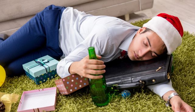 drunk guy, intoxicated guy, santa hat, brief case,beer