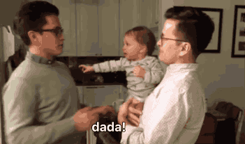 gif of twin dads and baby