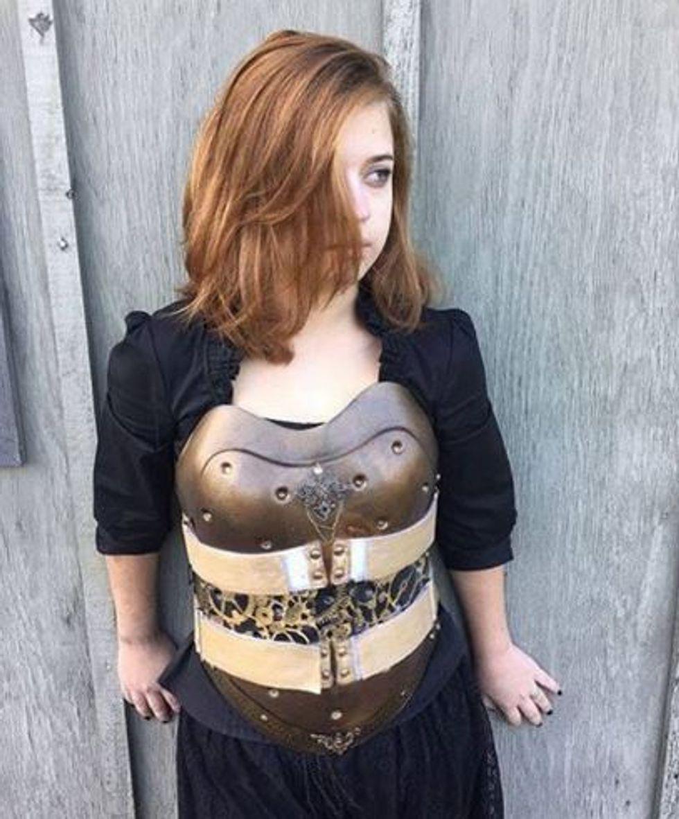 teenage girl wearing steampunk back brace