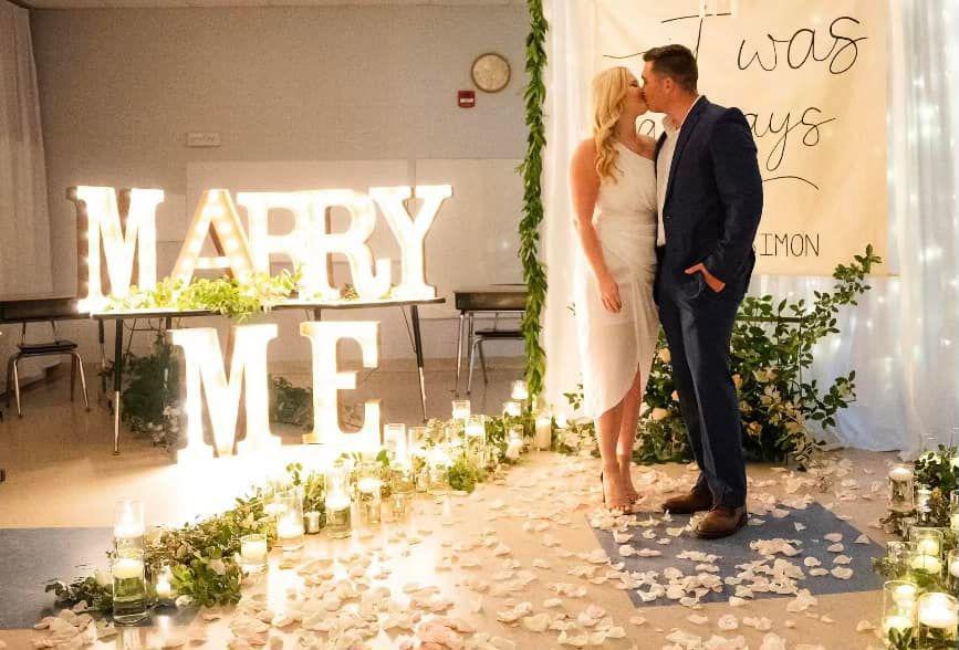 Couple get engaged in classroom