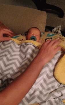 Gif of stretching baby in diaper