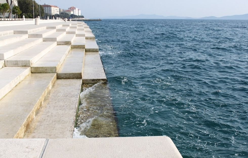 close up of waves hitting the sea organ